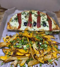 1/2 Lomo Pizza con Papas Cheddar